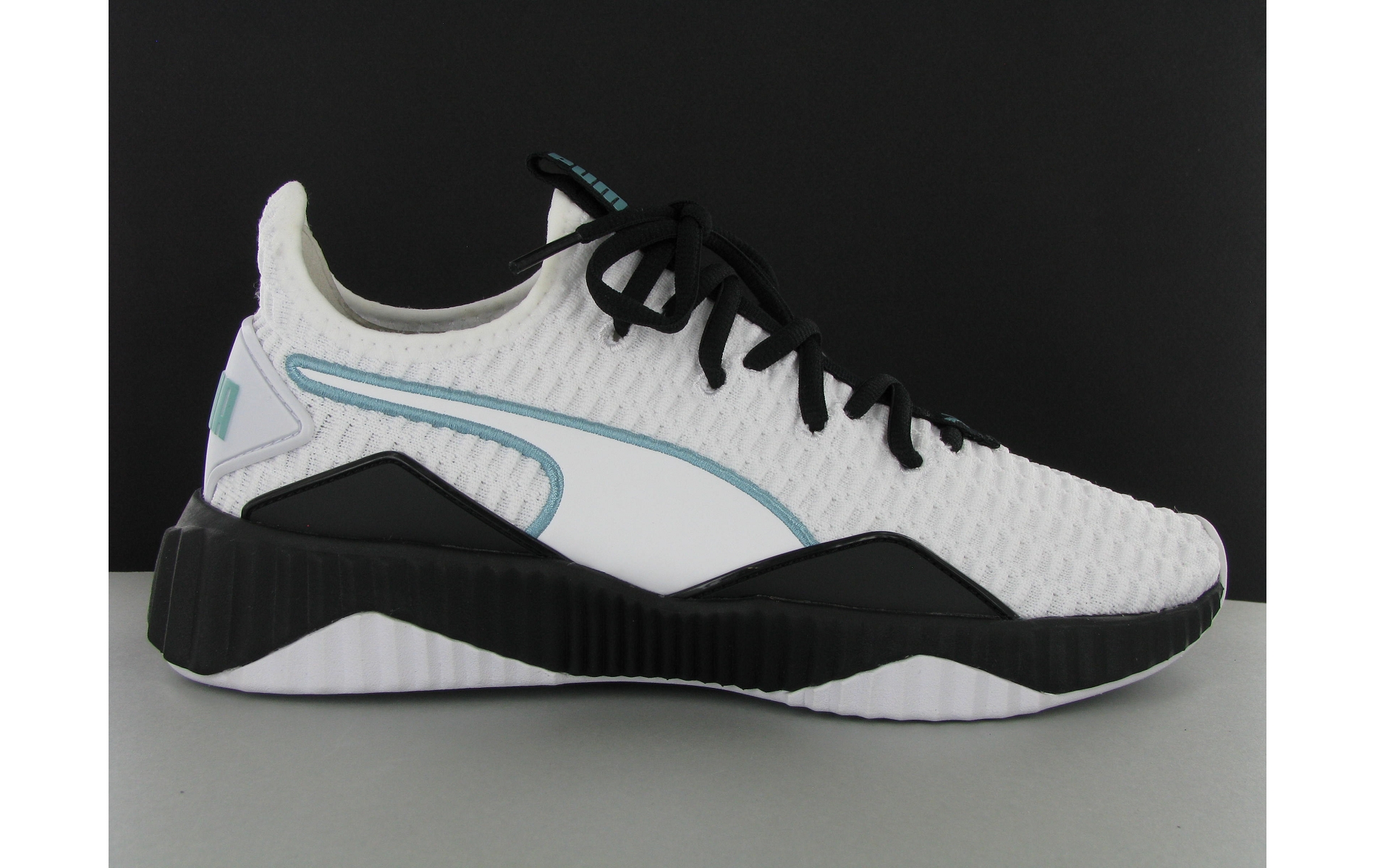 puma defy varsity white